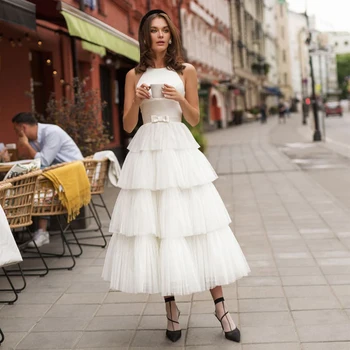 Midi düğün elbisesi Beyaz Tül Katmanlı O Boyun Kolsuz Kısa gelinlik Bir Çizgi Illusin Backless Çay Boyu Modern gelin kıyafeti